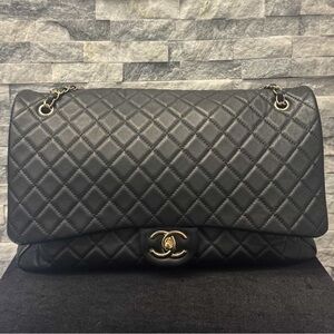 CHANEL Black Quilted XXL Travel Flap with Gold Hardware comes with entrupy COA
